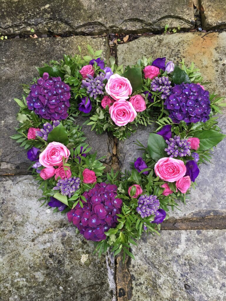 funeral flower heart tribuet pink roses